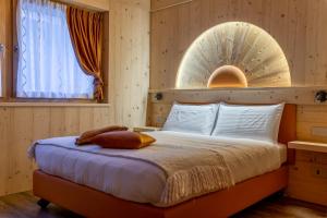 Chalet Imbosc'ché - 5 beautiful rooms in charming B&B tesisinde bir odada yatak veya yataklar