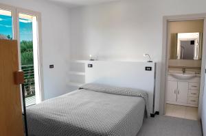 Postel nebo postele na pokoji v ubytování Hotel Marbella