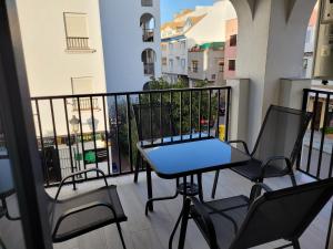 A balcony or terrace at Apartamentos SABINILLAS Még 37 kép