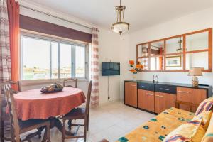 a kitchen and dining room with a table and a room at Isabel Dream III, 400m from the train in Rinchoa +19 photos