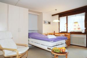 Postel nebo postele na pokoji v ubytování Alpenhaus Bettmeralp