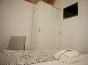 Postel nebo postele na pokoji v ubytování Agorà Home