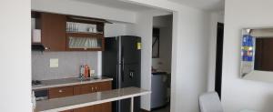 Kuchyň nebo kuchyňský kout v ubytování SUPER APARTAMENTO AMOBLADO, Norte de Neiva