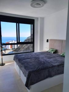 Voodi või voodid majutusasutuse Fuengirola Middel Views toas