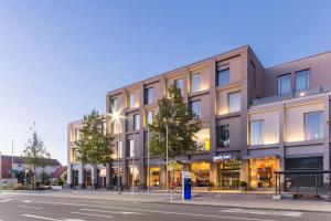 a rendering of a building on a city street at Park Inn by Radisson Neumarkt in Neumarkt in der Oberpfalz