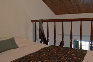 Llit o llits en una habitació de Wisdom Garden Home Stay