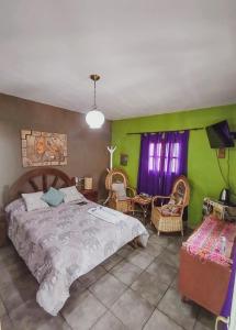 Ένα ή περισσότερα κρεβάτια σε δωμάτιο στο Hospedaje Familiar Raza Mistica +150 φωτογραφίες