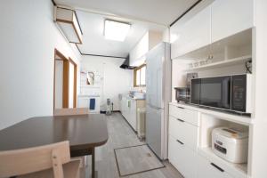 Η κουζίνα ή μικρή κουζίνα στο Furano Ski House