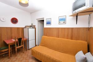 TV a/nebo společenská místnost v ubytování Apartments 2M
