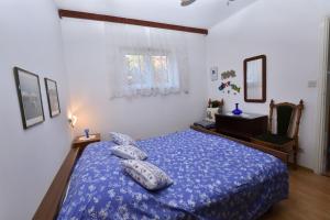 Postel nebo postele na pokoji v ubytování Apartments 2M