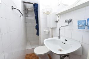 Koupelna v ubytování Apartments 2M