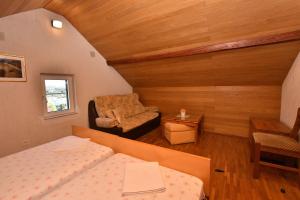 Postel nebo postele na pokoji v ubytování Apartments 2M