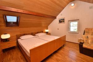 Postel nebo postele na pokoji v ubytování Apartments 2M