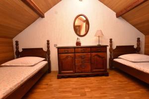 Postel nebo postele na pokoji v ubytování Apartments 2M