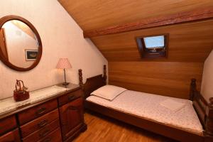 Postel nebo postele na pokoji v ubytování Apartments 2M