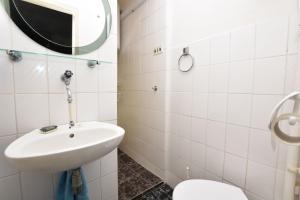 Koupelna v ubytování Apartments 2M