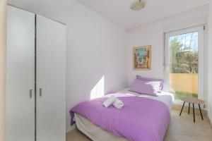 Postel nebo postele na pokoji v ubytování Apartments and Room Excelsior