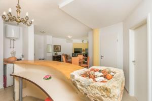 Kuchyň nebo kuchyňský kout v ubytování Apartments and Room Excelsior