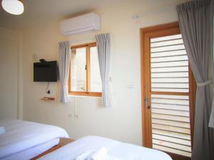 Letto o letti in una camera di Mulight B&B