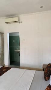 Postel nebo postele na pokoji v ubytování Chendana Homestay Bali