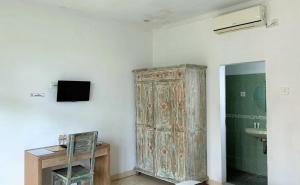 TV a/nebo společenská místnost v ubytování Chendana Homestay Bali
