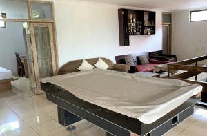 Postel nebo postele na pokoji v ubytování Chendana Homestay Bali