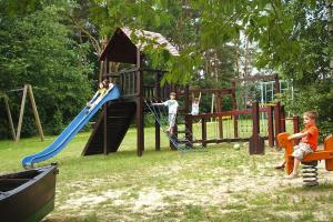a group of children playing on a playground at Seepark Heidenholz, Plau am See in Plau am See