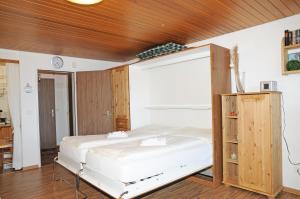 Postel nebo postele na pokoji v ubytování Alpenhaus Bettmeralp