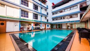 Bazén v ubytování La-Paz Gardens Beacon Hotel - Vasco da Gama Goa nebo v jeho okolí