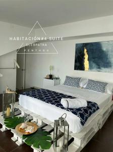 En eller flere senger på et rom på Penthouse 360 Cartagena