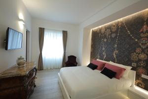 Posteľ alebo postele v izbe v ubytovaní Gonzaga Guest House