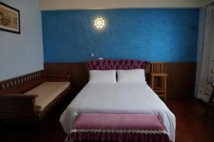 Ένα ή περισσότερα κρεβάτια σε δωμάτιο στο HL Sea Homestay