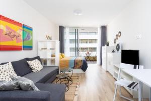 A television and/or entertainment centre at Home2Book Sea View Studio Puerto de la Cruz