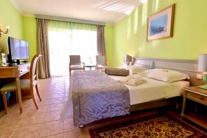 Katil atau katil-katil dalam bilik di Marina Frapa Resort Rogoznica