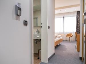 Postel nebo postele na pokoji v ubytování Hotel Coronado