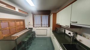 Kuchyň nebo kuchyňský kout v ubytování El Capricho de Cangas 2H - WiFi - Garaje - Hidromasaje - VUT-3001-AS