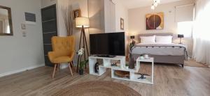 A television and/or entertainment centre at Chrysalis 2