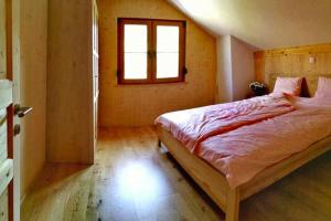 En eller flere senge i et værelse på Holiday resort Altaussee, Lichtersberg