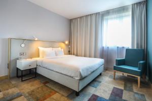 Postel nebo postele na pokoji v ubytování Magnus Resort