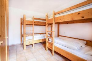 a bunk bed room with two bunk beds at Chalet, Hochkrimml in Krimml