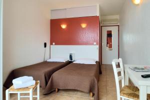 Postel nebo postele na pokoji v ubytování Hotel Alata