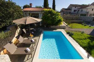 Bazén v ubytování Charming villa Kalu with private pool near Rovinj by WiiBuk nebo v jeho okolí