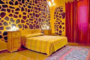 Postelja oz. postelje v sobi nastanitve Holiday home Castiglione di Sicilia