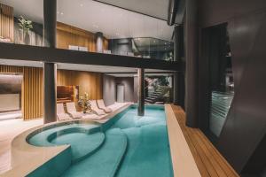 a pool in the middle of a house at Elite Hotel & Spa in Mestre