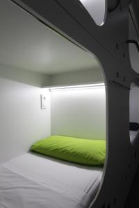 Posteľ alebo postele v izbe v ubytovaní Dream Cube Hostel
