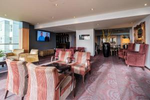 a lobby of a hotel with chairs and a table at Hull Humber View Hotel, BW Signature Collection in Hull