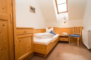 Postel nebo postele na pokoji v ubytování Hotel Montana