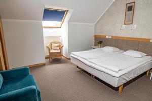 Postel nebo postele na pokoji v ubytování Hotel Sanvilla
