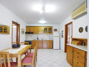 Kuchyň nebo kuchyňský kout v ubytování Rouladina Apartments
