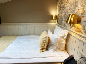Кровать или кровати в номере Бутик Отель Арбат 6